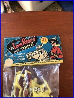 1957 MARX LONE RANGER WITH TONTO 27 Piece Playset. Unopened Header Bag