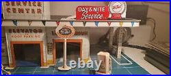 LOUIS MARX 1950's TIN LITHO MARX DAY NITE SERVICE STATION WITH SKY VIEW PARKING