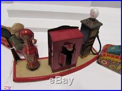 Marx Toys Lighted Gas Pump Station Prewar Boy Sled Turn Over Wind Up Tank Good