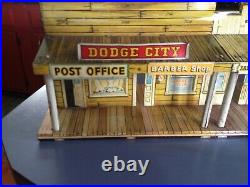 Marx 1950's tin Dodge City litho with 2 figures